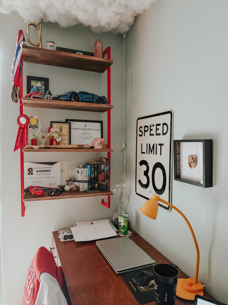 speed limit sign, porsche emblem, shelves, cars, desk, kelton, teen room