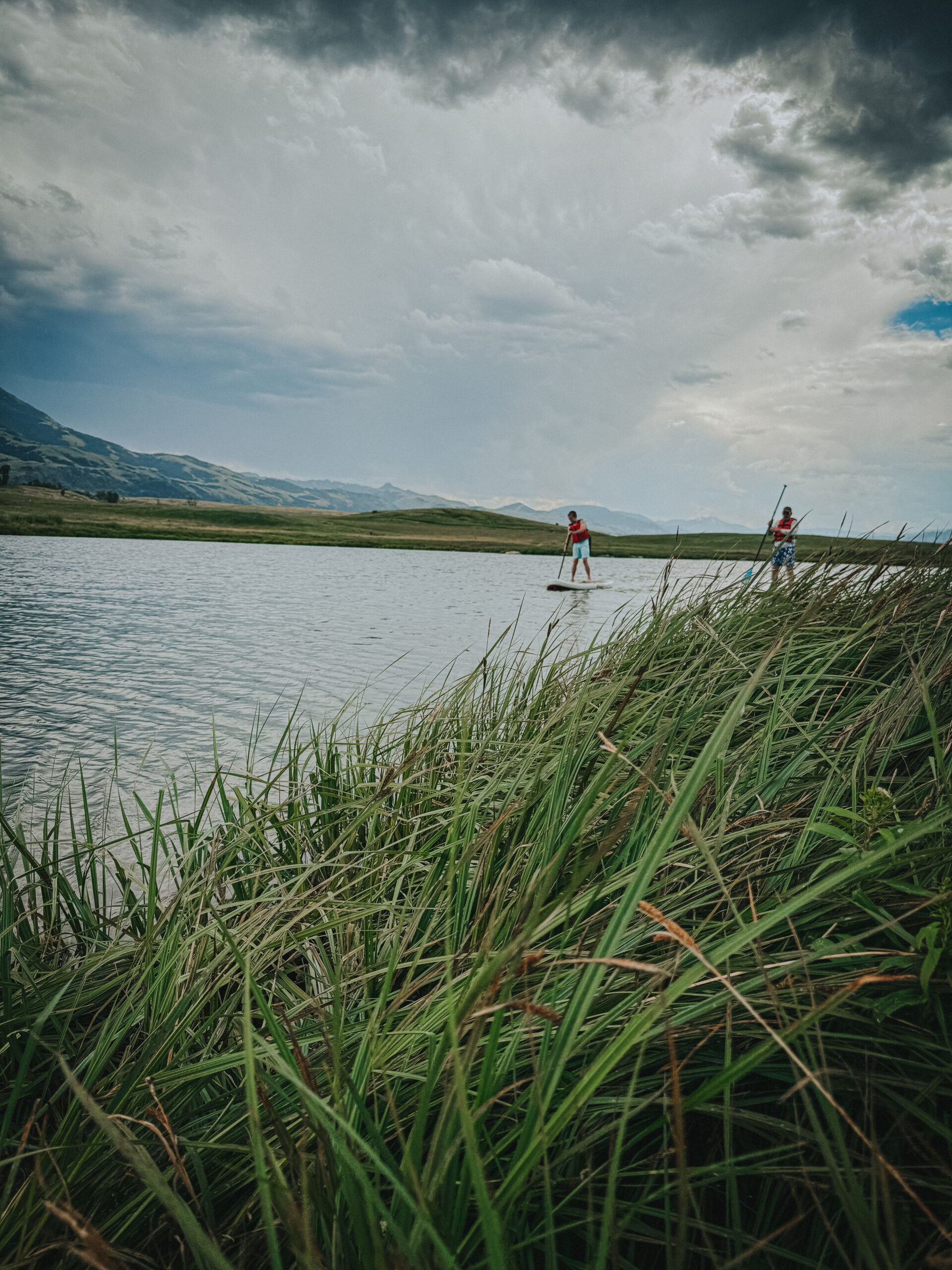 Paddleboarding on the pond at Sage Lodge, Montana family vacation