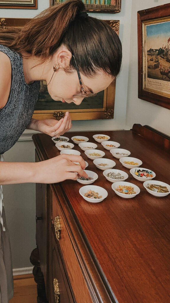 woman picking out her charms