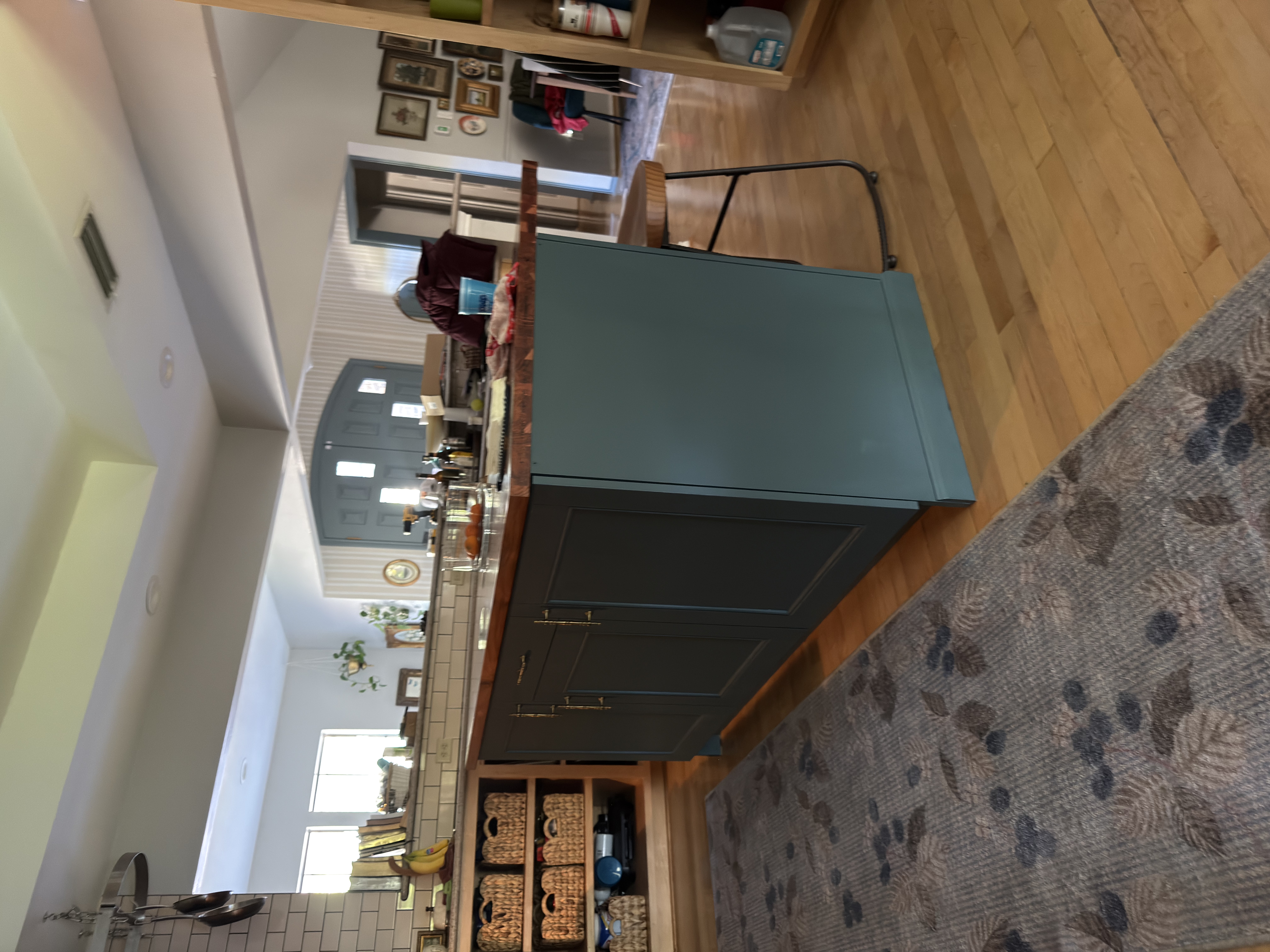DIY kitchen island makeover with Homestead Blue paint and vintage brass hardware